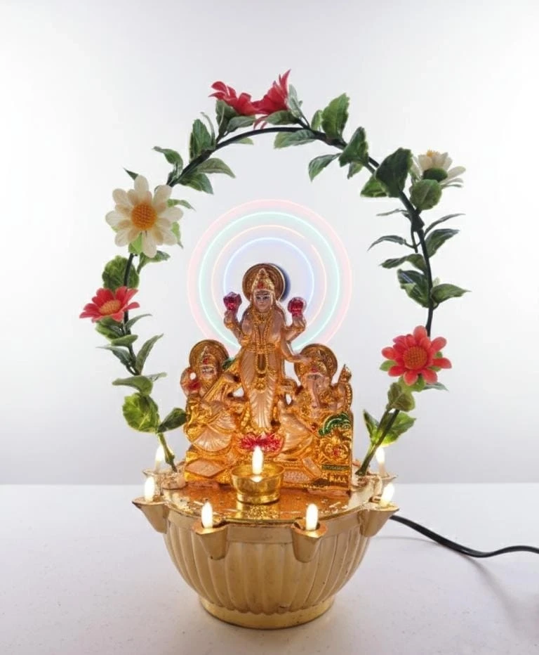 Divine Lakshmi Ganesh Idol with Rotating LED Fan & Floral Arch